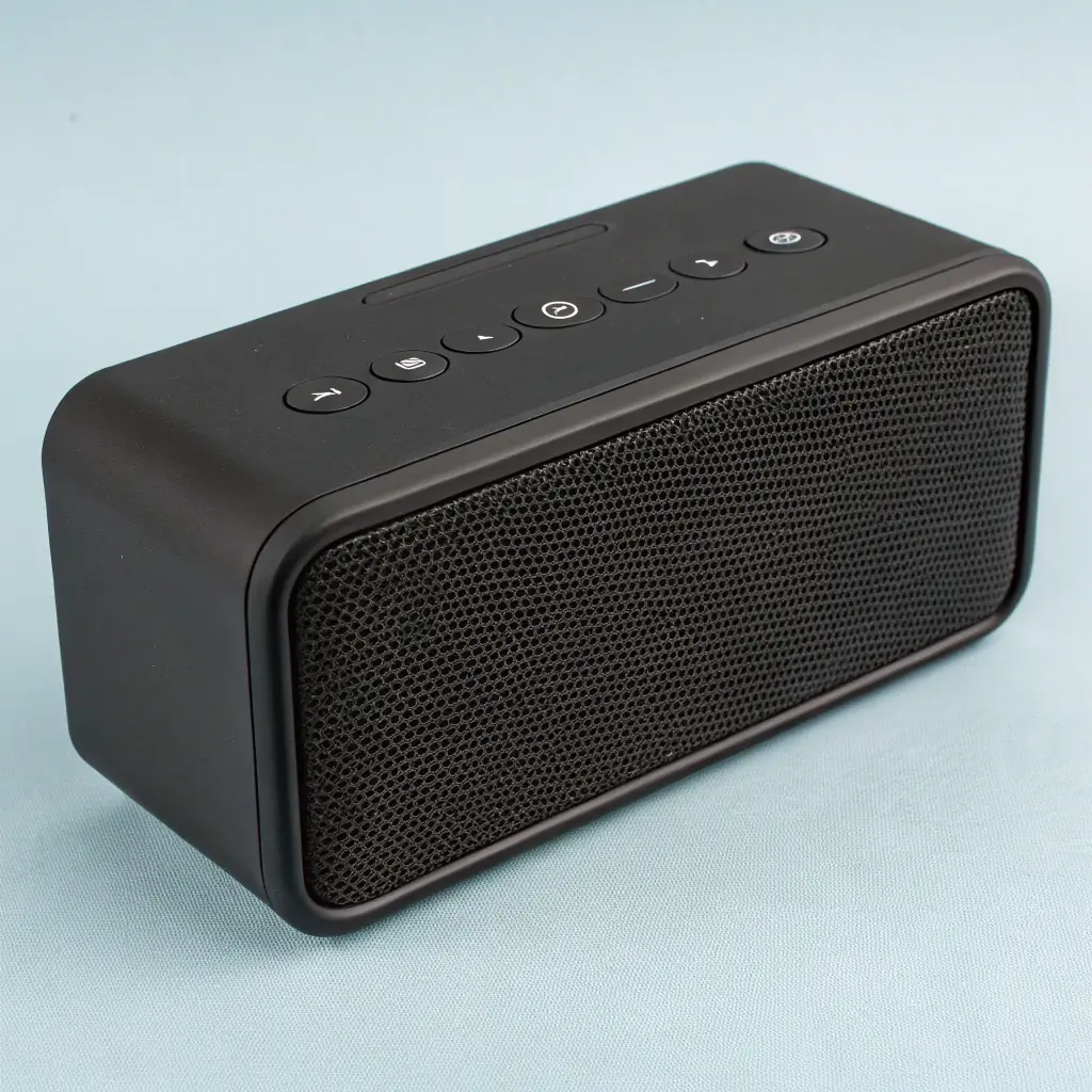 A modern Bluetooth speaker with a sleek, minimalist design.
